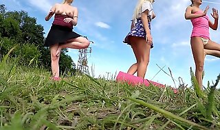 Outdoors public fitness in shortest skirts on a windy day outside with many upskirts and asses exhibitions