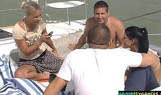Amateur babes in group sucking dick on a boat