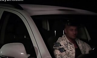 Blonde hottie is getting undressed in a car on the way to public sex gang bang