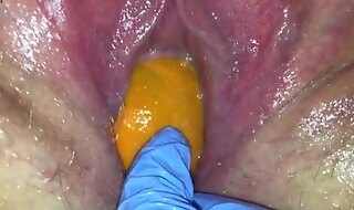 Tight pussy milf gets her pussy destroyed with a orange and big apple popping it out of her tight hole making her squirt