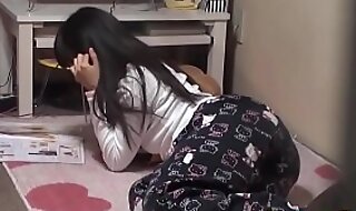 Masturbating asian babe gets spied on
