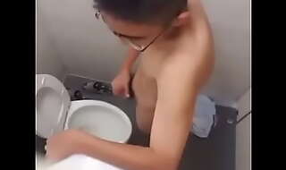 Putrescent Chinese man jerking off forth all instructions porn forth shit stall