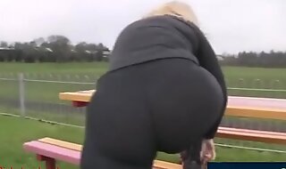 Mature milf walk with big ass leggings in park